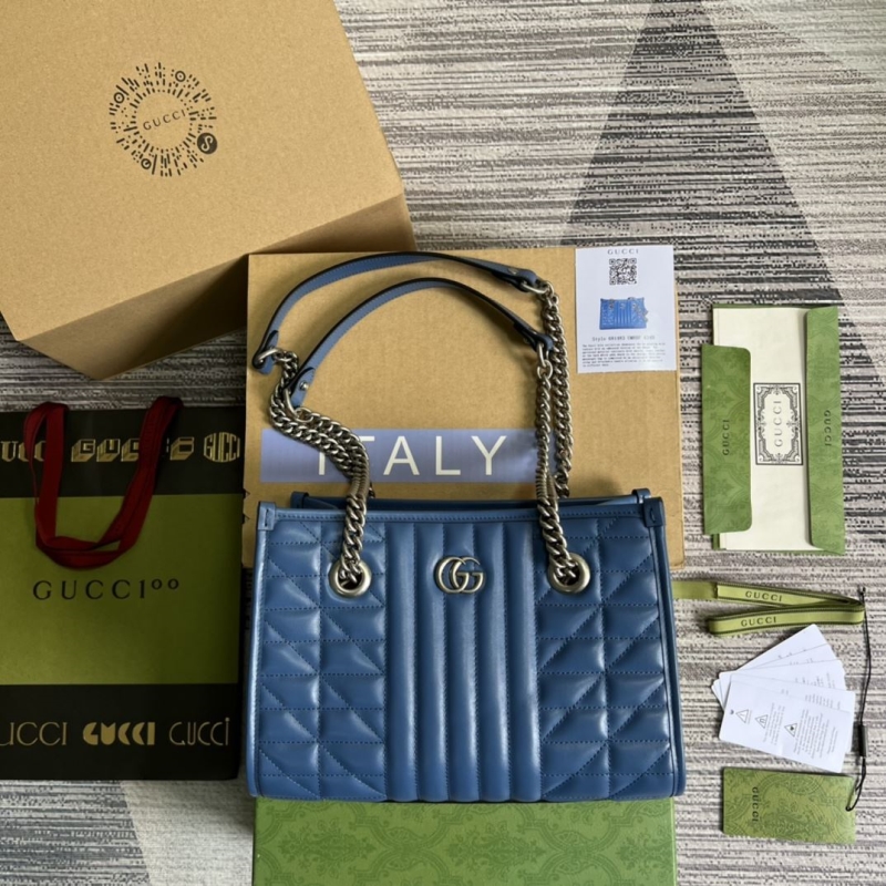 G*u*i shopping bags